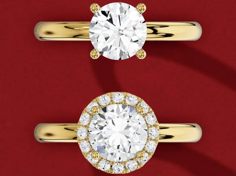 3D render of two yellow gold rings seen from above at the same scale, a 1.5 carat round solitaire above a 1.5 carat round with a halo