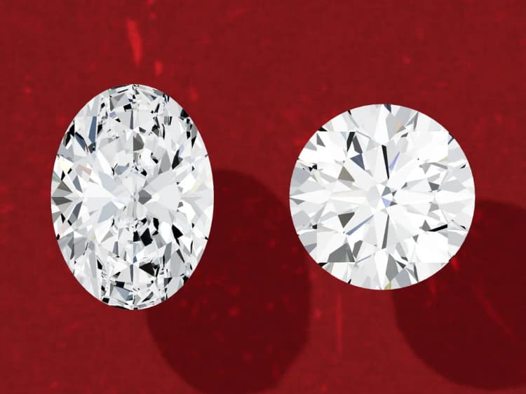 3D render of a loose 1.5 carat oval diamond beside a loose 1.5 carat round diamond, face up at the same scale