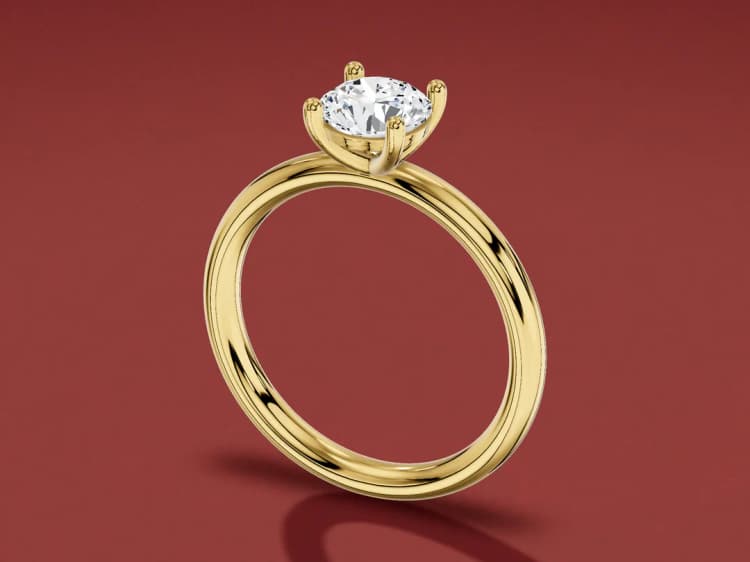 3D render of a yellow gold solitaire with a 1 carat round diamond