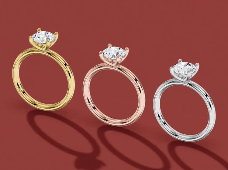 3D render of the same round solitaire in yellow, rose and white gold, side by side