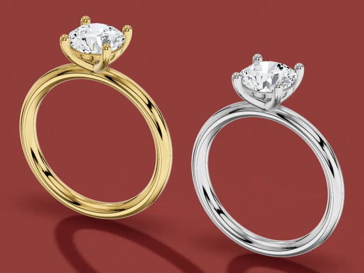 3D render of the same round solitaire in yellow gold and in white gold, side by side