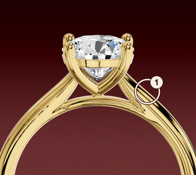 Close-up of a cathedral solitaire shoulder, circled and numbered 1 for a design question, by Lily Dia Jewellery