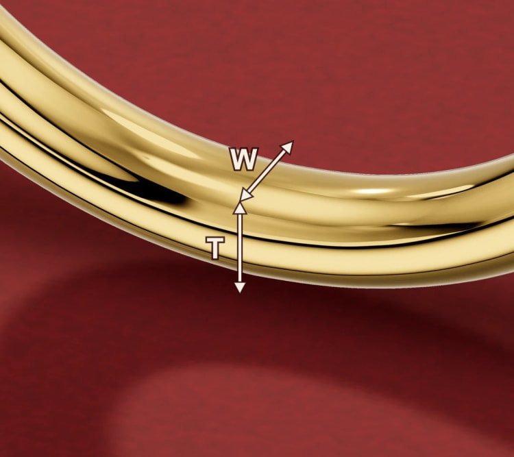 Close-up of a yellow gold ring band, with W marking its width and T marking its thickness, by Lily Dia Jewellery