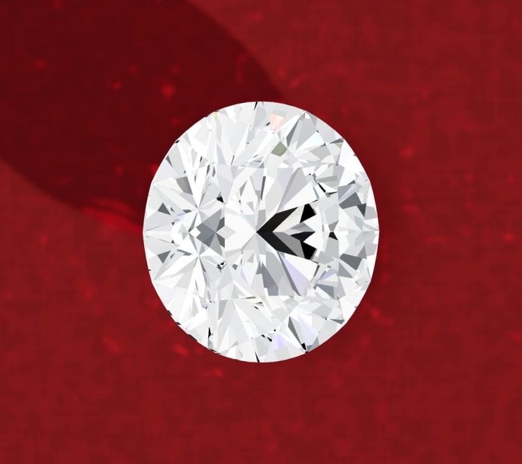 Round side stone diamond seen face up on its own, by Lily Dia Jewellery