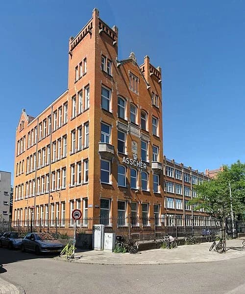 The Asscher diamond company building in Amsterdam, where the asscher cut was developed, an asscher cut diamond shape education guide by Lily Dia Jewellery