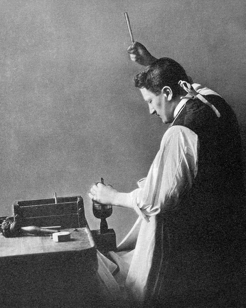 A historical photograph of Joseph Asscher cleaving the Cullinan diamond in 1908, an asscher cut diamond shape education guide by Lily Dia Jewellery