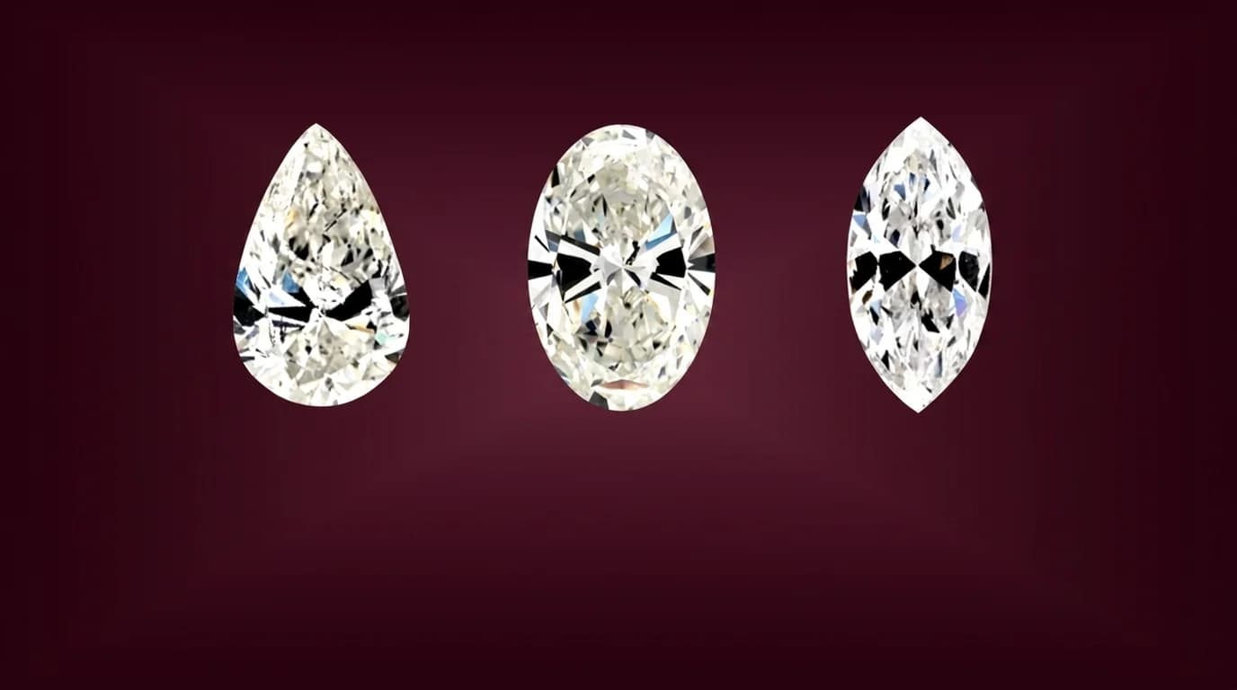 A pear shaped diamond shown beside an oval and a marquise diamond, the three elongated brilliant cuts compared side by side, a pear shaped diamond shape education guide by Lily Dia Jewellery