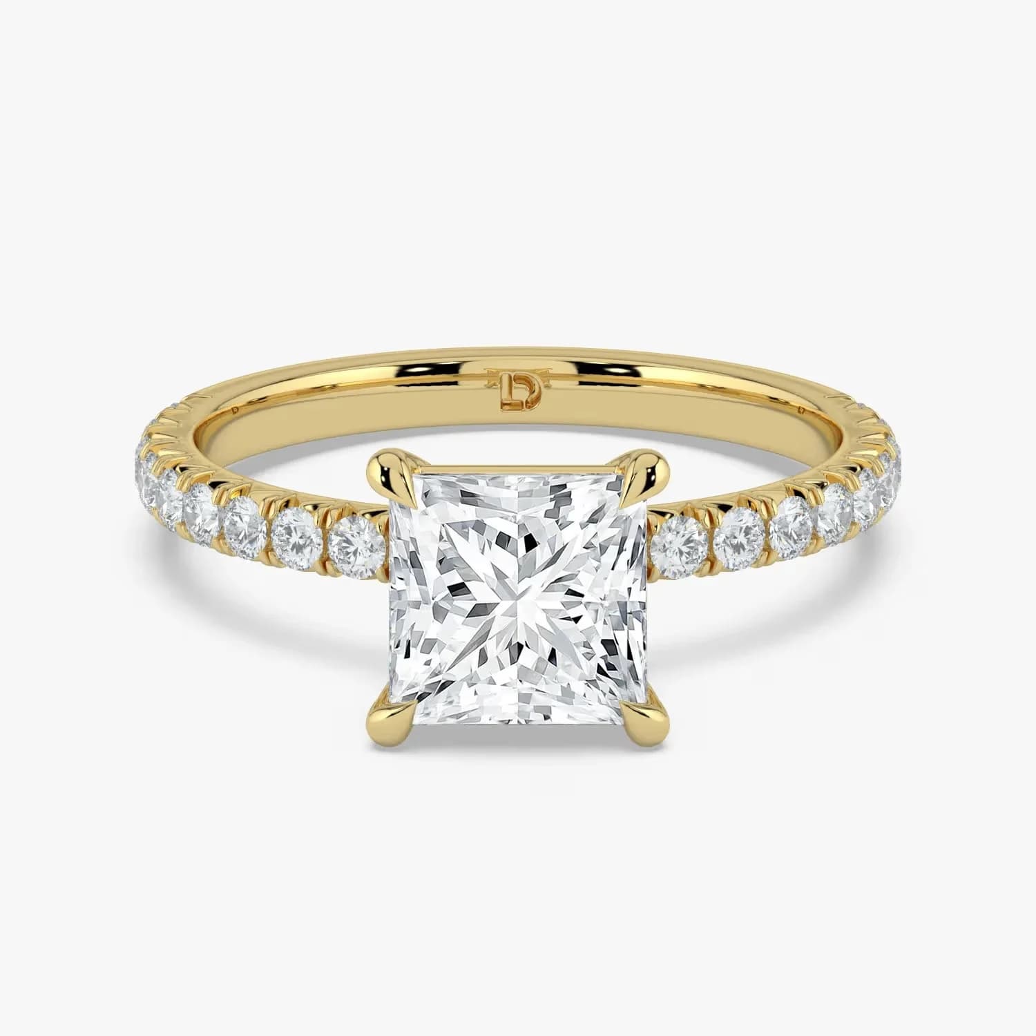 A princess cut diamond engagement ring with a pave diamond band in yellow gold, a princess cut diamond shape education guide by Lily Dia Jewellery
