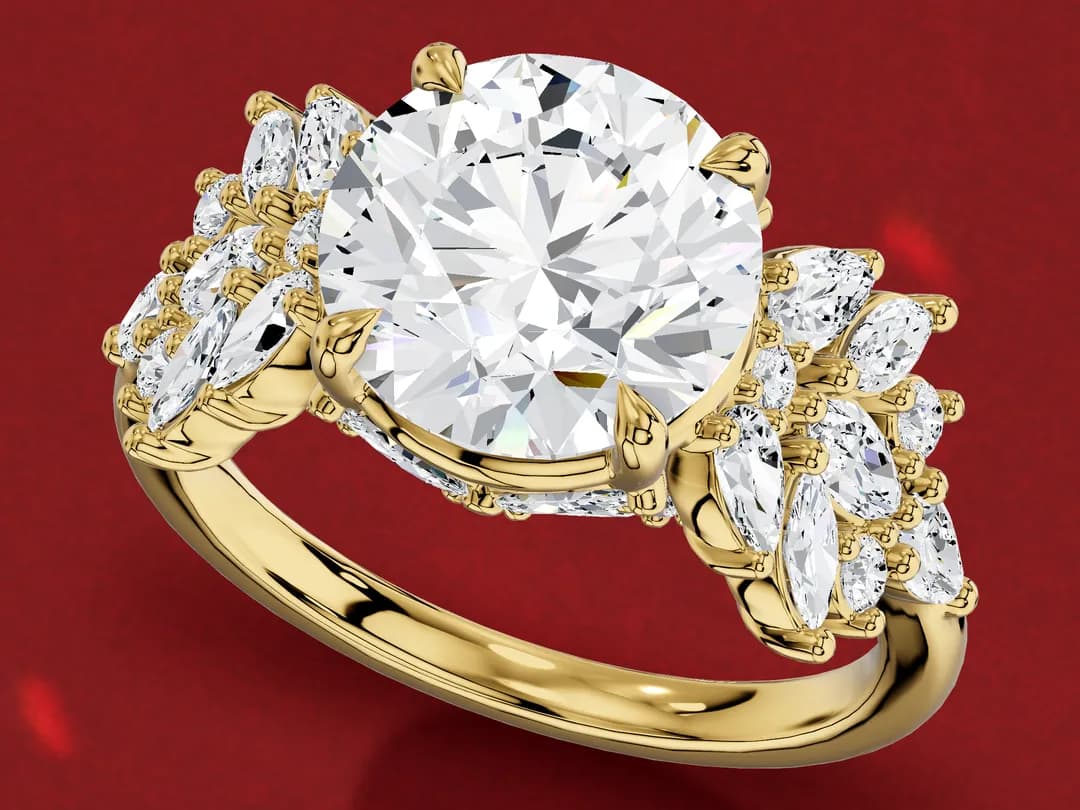 3D render of a yellow gold ring with a large round diamond and a cluster of small marquise and round diamonds on each shoulder.