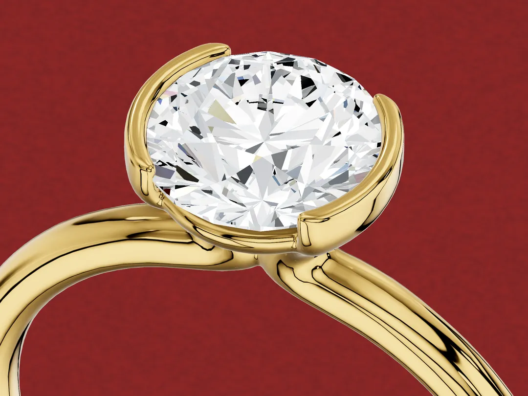 3D render close up of a round diamond held by two curved metal rims on opposite sides, its other edges open.