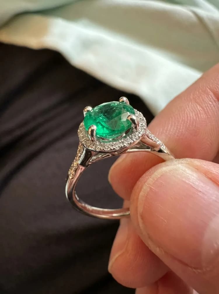 Engagement ring with loose claws and rattling stone by Lily Dia Jewellery