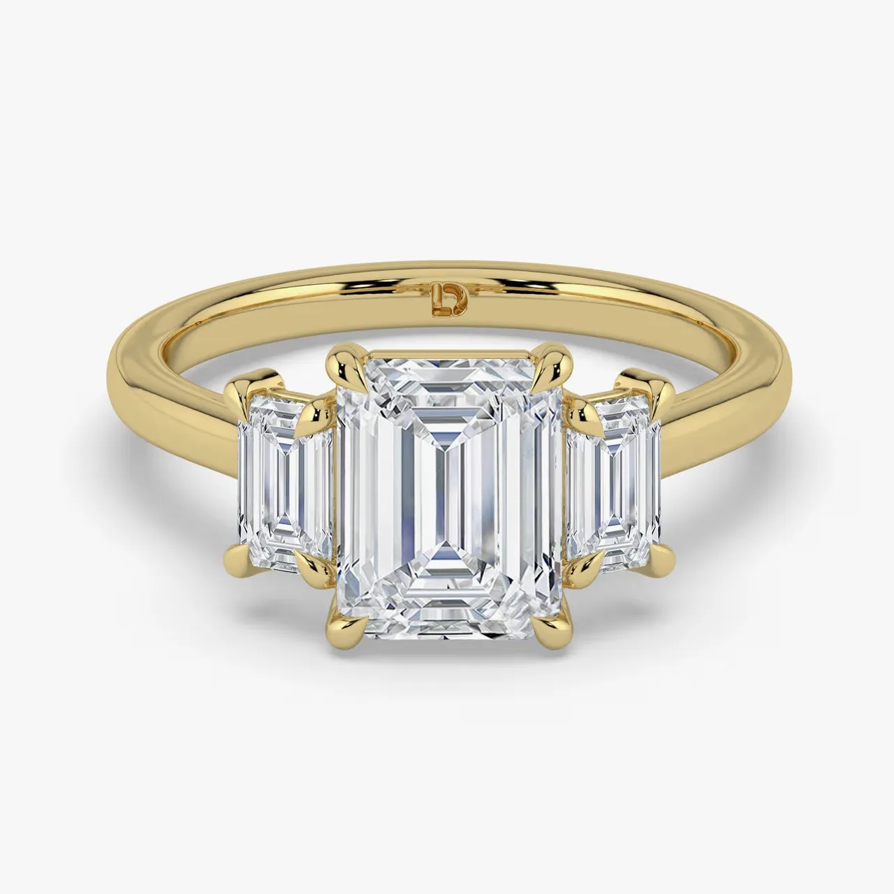 Juniper emerald three stone engagement ring by Lily Dia Jewellery