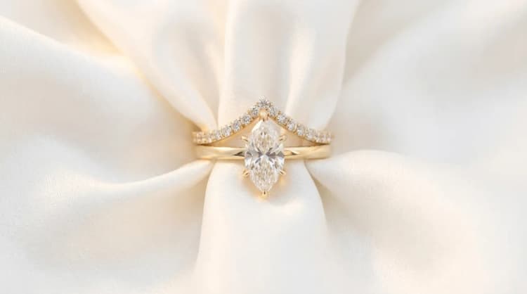 Curved wedding band with marquise engagement ring by Lily Dia Jewellery