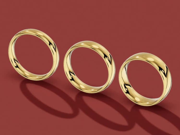 3D render of three plain yellow gold wedding bands, 4mm, 5mm and 6mm wide from left to right